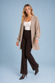 Gilet long beige manches bouffantes | Vue en mouvement | Lounelle Paris