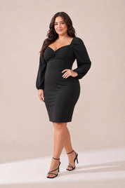 Robe noire moulante manches bouffantes | Porté sur une silhouette plus ronde | Lounelle Paris