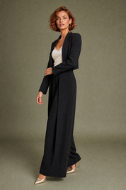 Pantalon large noir plis devant | Vue de profil | Lounelle Paris