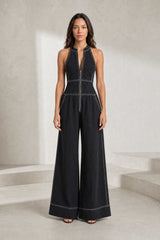 Black sleeveless high-neck jumpsuit