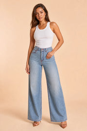 Jean bleu taille haute jambe large | Vue de face | Lounelle Paris