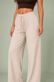 Pantalon large abricot taille élastique | Vue rapprochée | Lounelle Paris
