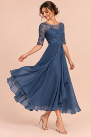 Robe en mousseline à corsage brodé bleu marine | Vue de dos | Lounelle Paris