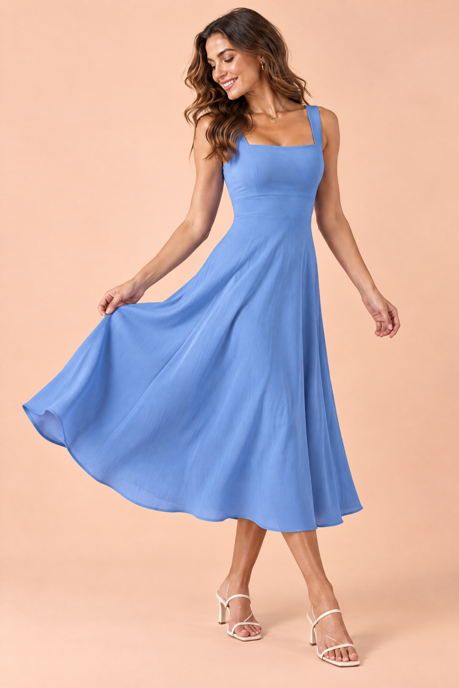 Robe midi bleue à fines bretelles et jupe évasée | Vue de dos | Lounelle Paris