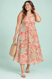Robe midi corail à imprimé floral | Porté sur une silhouette plus ronde | Lounelle Paris