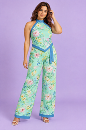 Combishort asymétrique vert menthe à imprimé floral et encolure dos nu | Porté sur une autre silhouette | Lounelle Paris