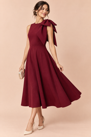 Robe midi bordeaux à encolure asymétrique et manche à nœud | Vue de face | Lounelle Paris