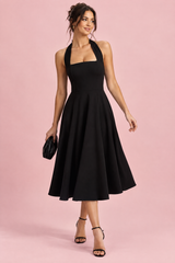 Black midi dress with a fit-and-flare skirt and square neck