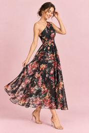 Robe longue fleurie noire à une épaule, coupe trapèze | Vue de dos | Lounelle Paris