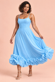 Robe midi bleu ciel évasée à bas volanté | Porté sur une autre silhouette | Lounelle Paris
