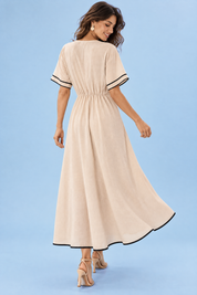 Robe longue beige à col V et taille nouée | Vue de dos | Lounelle Paris