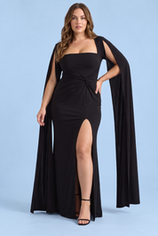 Robe longue moulante noire à encolure carrée, effet torsadé et manches façon cape | Porté sur une autre silhouette | Lounelle Paris