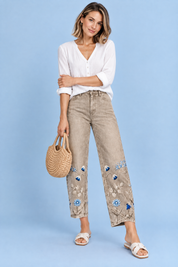 Pantalon beige à imprimé floral et ourlet fendu | Vue de dos | Lounelle Paris