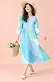 Robe midi trapèze plissée bleue | Vue en mouvement | Lounelle Paris