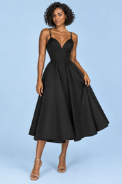Robe midi noire à fines bretelles et jupe ample | Vue de face | Lounelle Paris