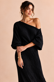 Robe asymétrique noire à épaule dénudée | Vue rapprochée | Lounelle Paris