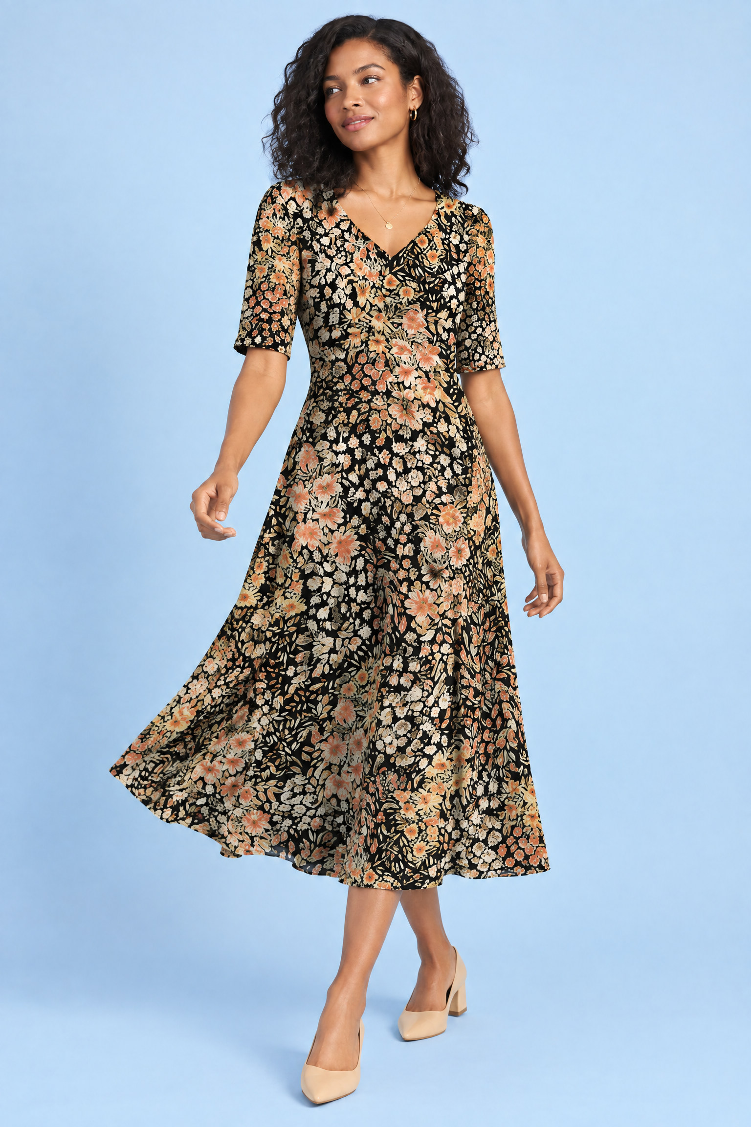 Robe longue noire à col V | Vue en mouvement | Lounelle Paris