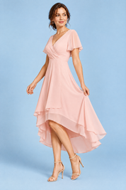 Robe rose à manches volantées et ourlet asymétrique | Vue de dos | Lounelle Paris