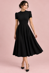 Black midi dress with round neck and puff sleeves