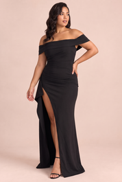 Robe longue noire à encolure Bardot, drapée et fendue | Porté sur une autre silhouette | Lounelle Paris