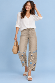 Pantalon beige à imprimé floral et ourlet fendu | Vue de face | Lounelle Paris