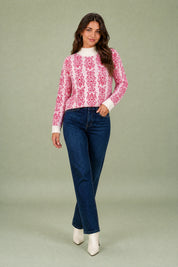 Pull rose jacquard col montant | Vue en mouvement | Lounelle Paris