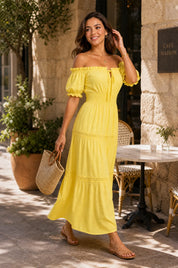 Robe longue jaune épaules dénudées | Photo lifestyle | Lounelle Paris