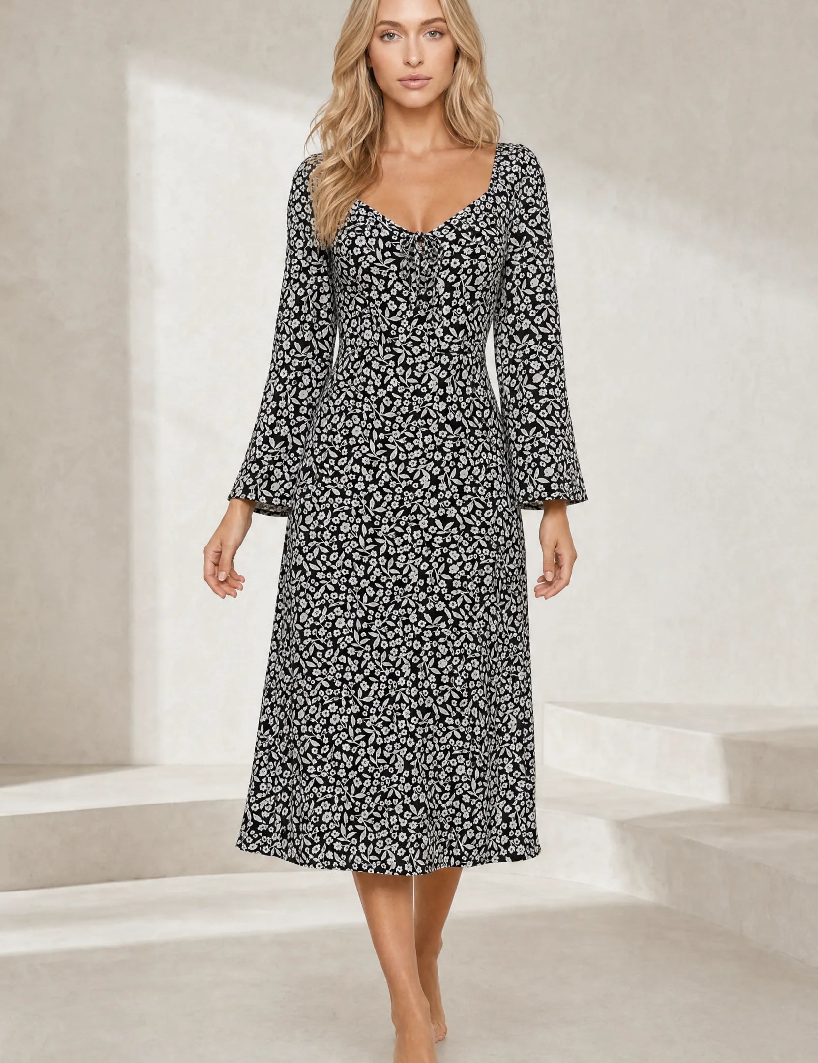 Robe noire à fleurs dos ouvert | Lounelle Paris