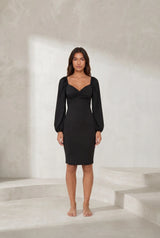 Robe noire moulante manches bouffantes